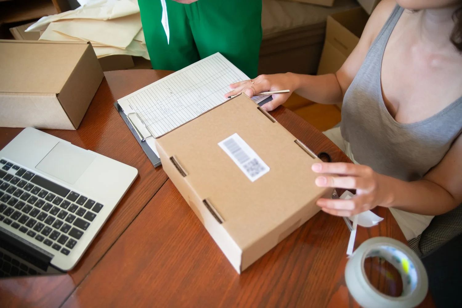 Amazon seller reviewing a wholesale distribution policy notice on a laptop