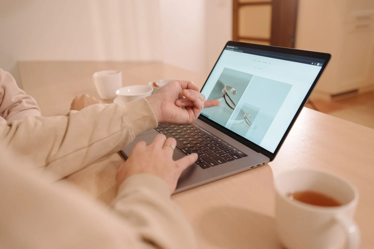 Amazon seller reviewing review request ad eligibility on laptop