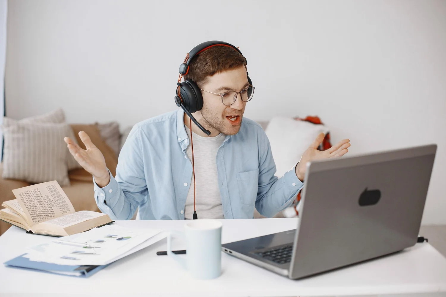 Amazon seller reviewing a one-star product review on a laptop screen