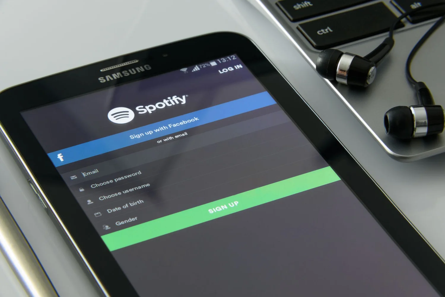 Seller signing into Amazon Seller Central with a passkey on a phone and laptop
