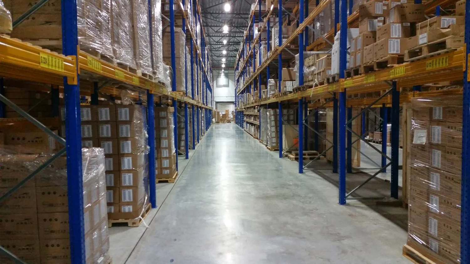 Amazon FBA warehouse boxes stacked on pallets for multipack shipping